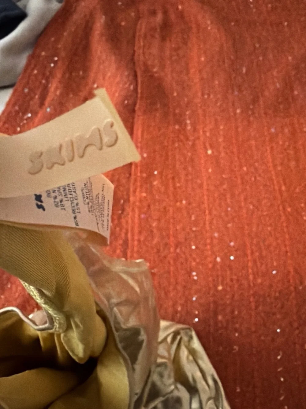 SKIMS Sparkle Orange Gold One-Piece